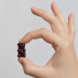 Close up of a Jeevanaa Sleep Support Gummy showing the oversized 4g melatonin free sleep gummy